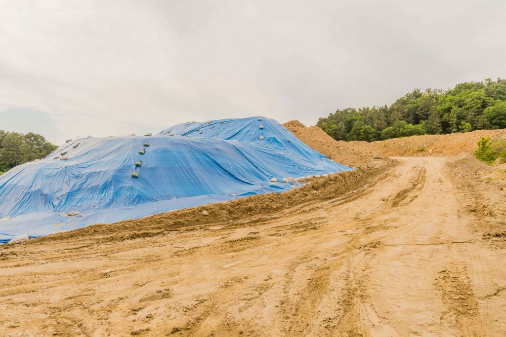 Large tarp protection dirt for construction